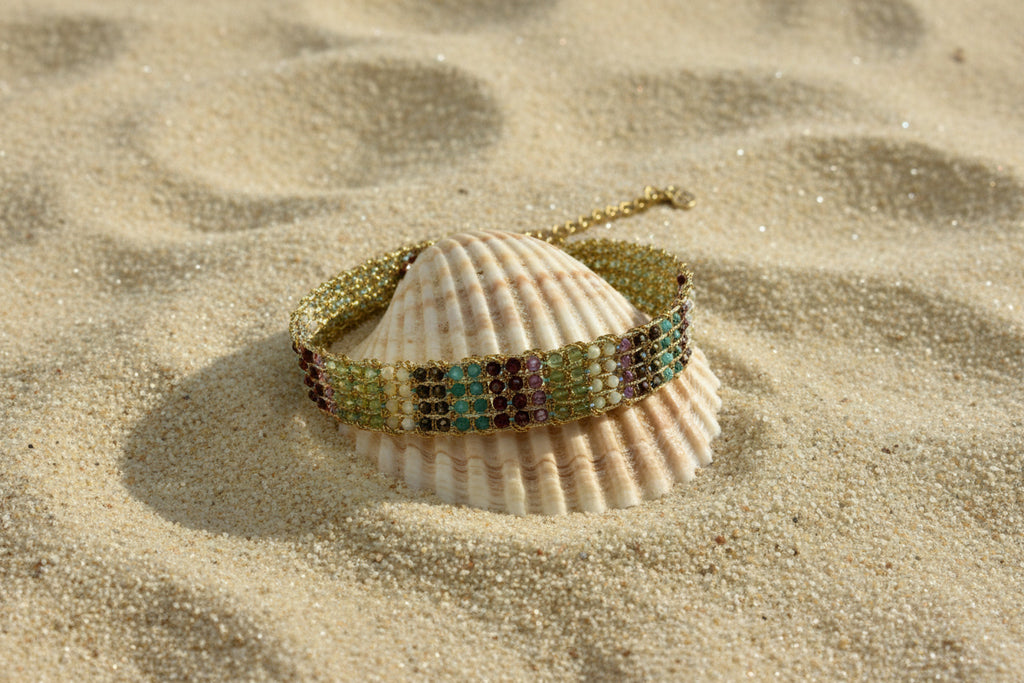 Bracelet tressé en acier inoxydable doré et pierres bicolores